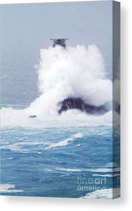 Longships Lighthouse Canvas Print featuring the photograph The Longships Lighthouse Meets Storm Diana In Cornwall by Terri Waters