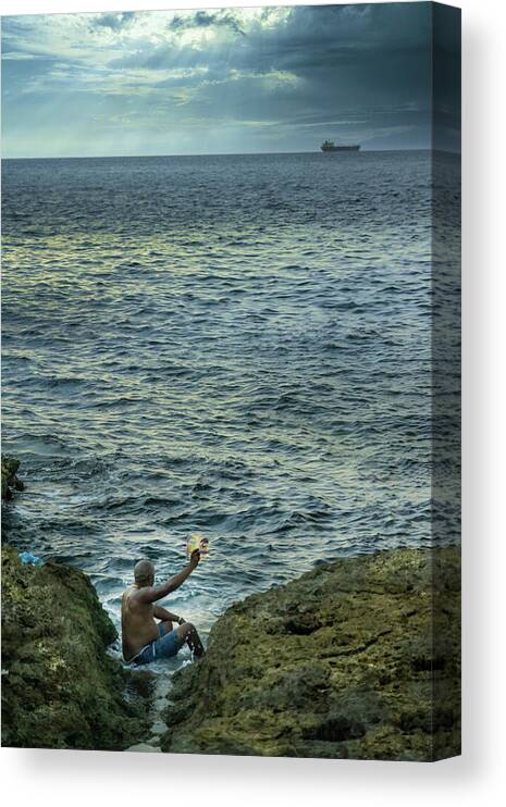 Storyteller Canvas Print featuring the photograph The man who tells stories to the fishes by Micah Offman