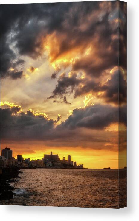 Sunset Canvas Print featuring the photograph The sky above the Malecon of Havana by Micah Offman