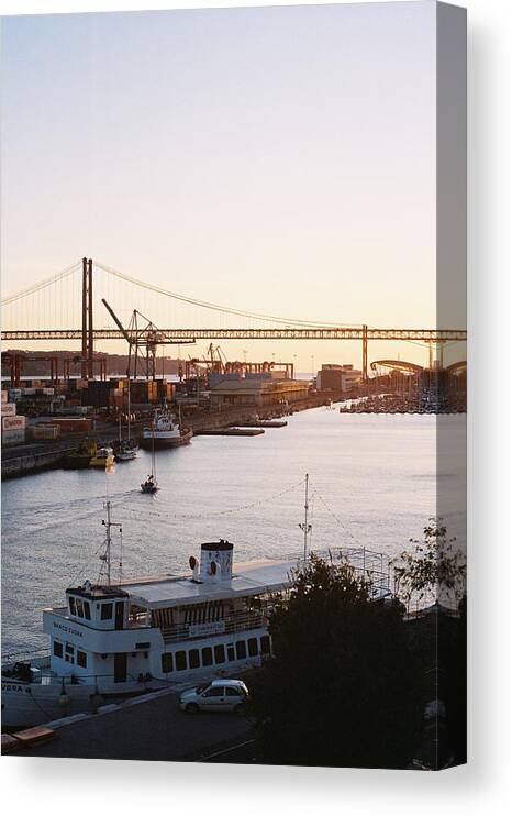 Cityscape Canvas Print featuring the photograph The sun going down on the bay by Barthelemy de Mazenod
