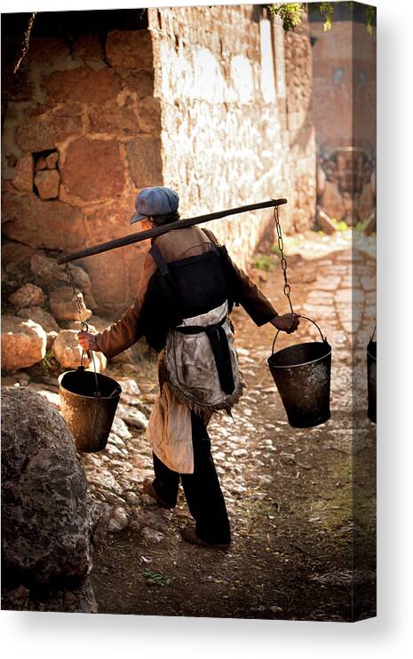 China Canvas Print featuring the photograph The Water Carrier by Mark Gomez