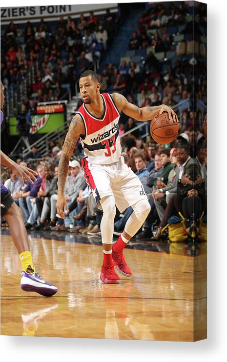 Smoothie King Center Canvas Print featuring the photograph Trey Burke by Layne Murdoch