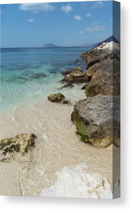 Mediterranean Canvas Print featuring the photograph Turquoise blue sea water and rocks in Calpe 1 by Adriana Mueller