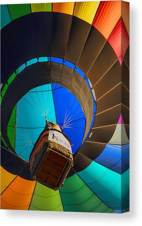 Wausau Canvas Print featuring the photograph Underneath A Rainbow Colored Hot Air Balloon by Dale Kauzlaric