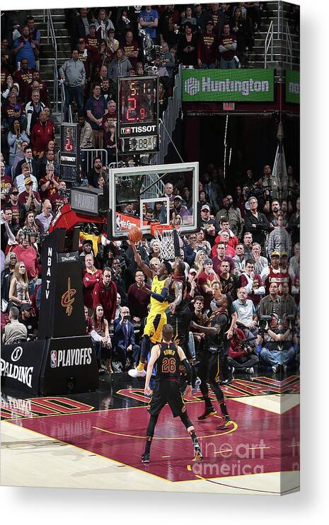 Lebron James Canvas Print featuring the photograph Victor Oladipo and Lebron James by Nathaniel S. Butler
