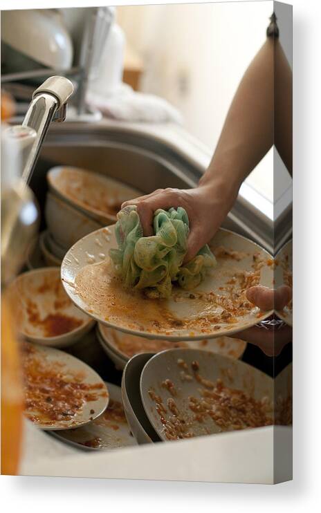 Hokkaido Canvas Print featuring the photograph Washing dishes with sponge by Artparadigm