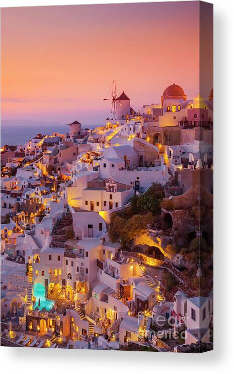 Santorini Oia Canvas Print featuring the photograph Windmill and white houses at sunset, Oia, Santorini, Greece by Neale And Judith Clark