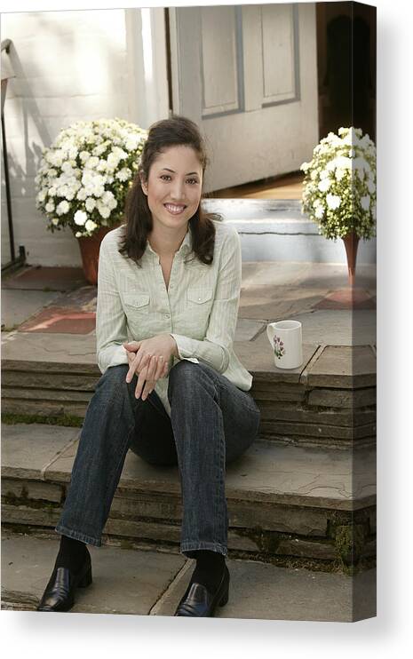 Steps Canvas Print featuring the photograph Woman sitting on steps by Comstock Images