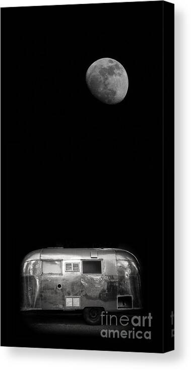 Black Canvas Print featuring the photograph Moonrise over Airstream by Edward Fielding