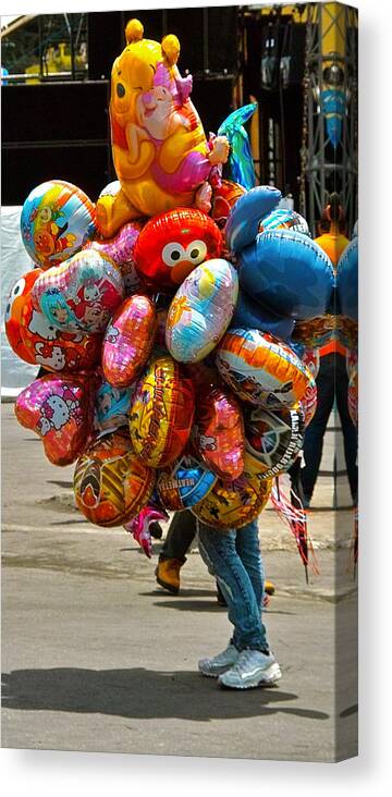 Balloon Canvas Print featuring the photograph The Balloon Lady by Jocelyn Kahawai