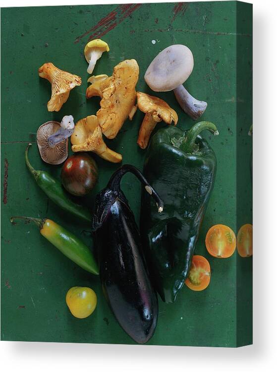 Fruits Canvas Print featuring the photograph A Pile Of Vegetables by Romulo Yanes