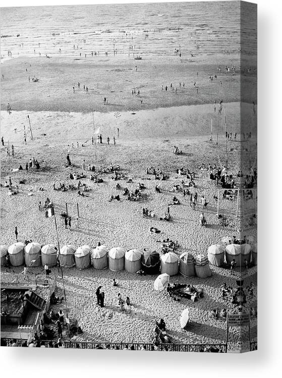 Beach Canvas Print featuring the photograph A Beach In Cherbourg by Erwin Blumenfeld