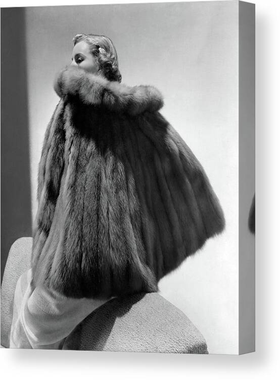 Accessories Canvas Print featuring the photograph A Model Wearing A Fur Cape by Horst P. Horst