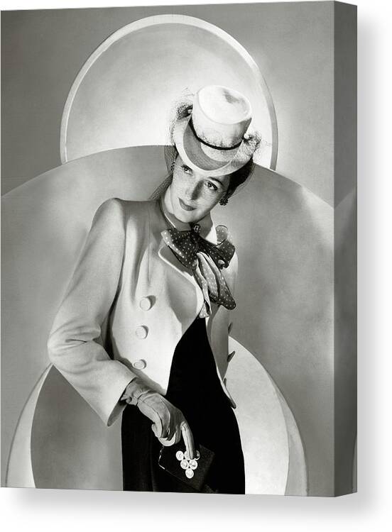 Coin Purse Canvas Print featuring the photograph A Model Wearing A Jacket And Hat by Horst P. Horst