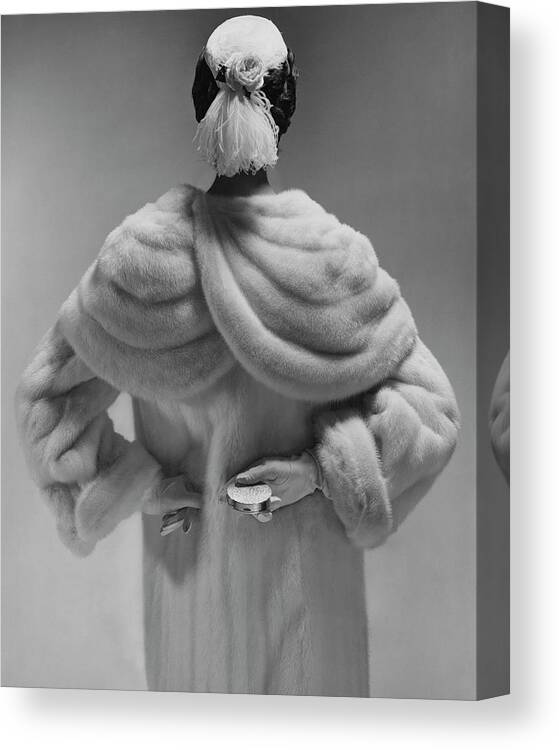 Accessories Canvas Print featuring the photograph A Model Wearing A Mink Coat by Erwin Blumenfeld