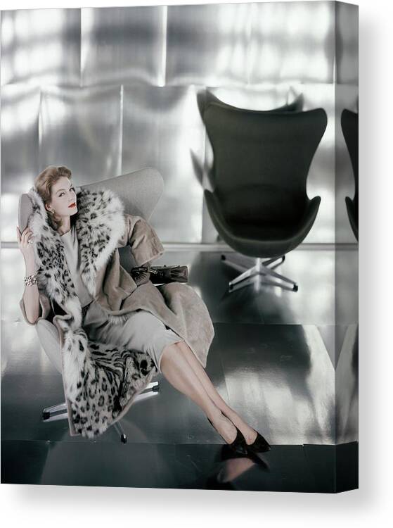 Fashion Canvas Print featuring the photograph A Model Wearing A Snow Leopard Coat by Henry Clarke