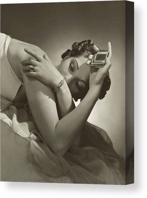 Jewelry Canvas Print featuring the photograph A Model Wearing Tiffany And Co Jewelry by Horst P. Horst