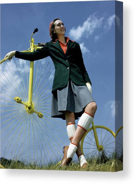 Accessories Canvas Print featuring the photograph A Model With An Old-fashioned Bicycle by Toni Frissell