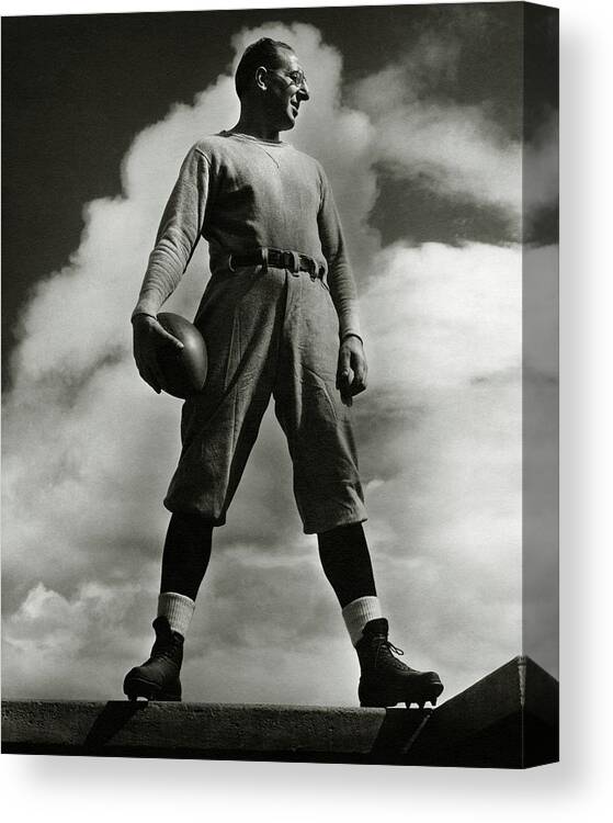 Education Canvas Print featuring the photograph A Portrait Of Lou Little With A Football by Lusha Nelson