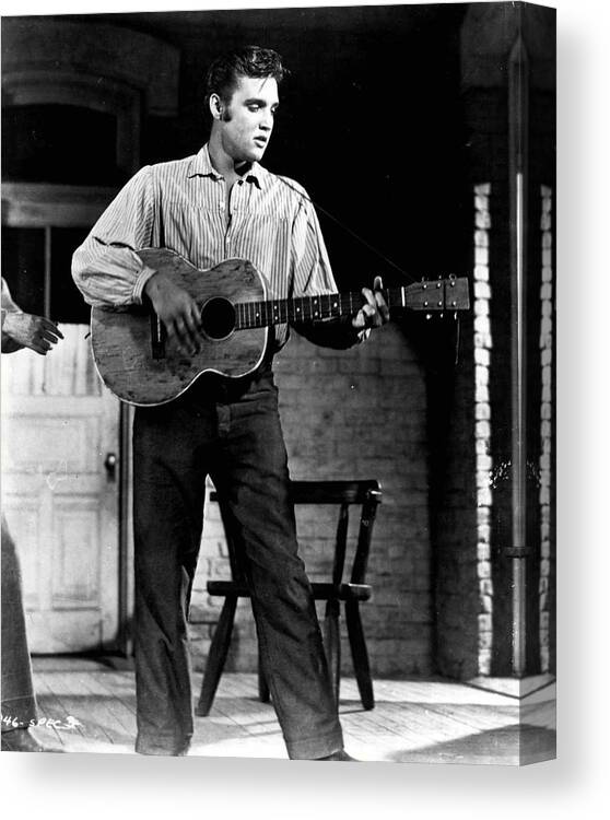 Classic Canvas Print featuring the photograph Elvis Presley Playing Outside by Retro Images Archive