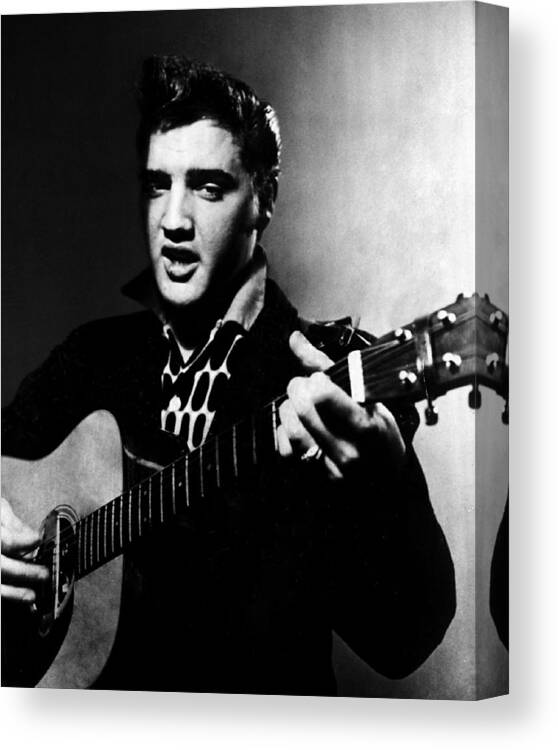 Classic Canvas Print featuring the photograph Elvis Presley Strums The Guitar by Retro Images Archive
