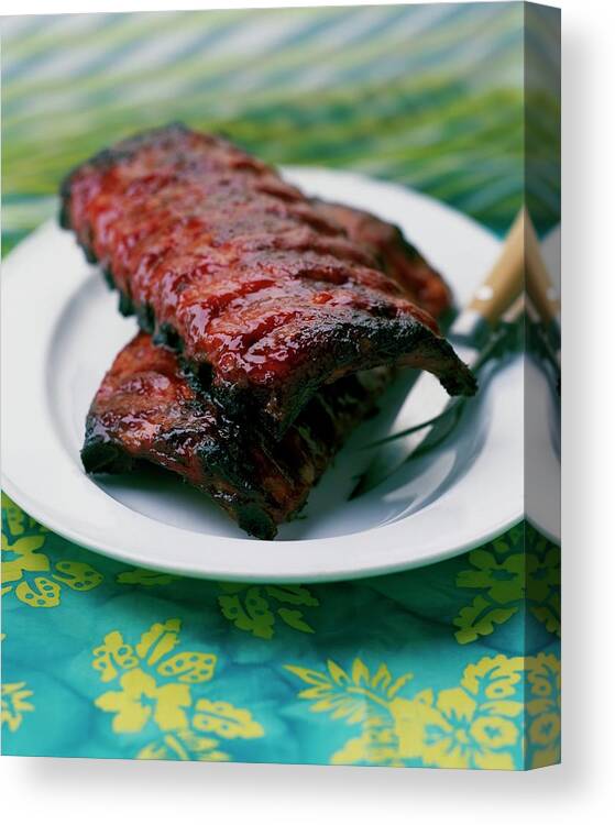 Cooking Canvas Print featuring the photograph Grilled Ribs On A White Plate by Romulo Yanes