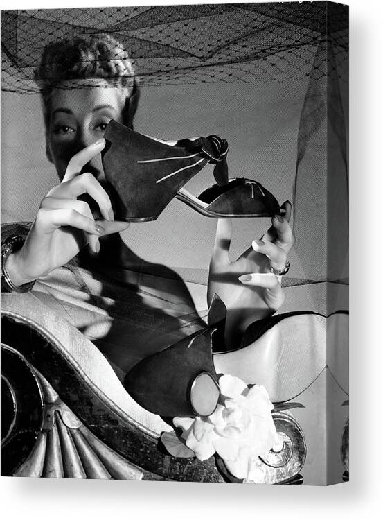 Accessories Canvas Print featuring the photograph Helen Bennett Holding A High Heel by Horst P. Horst