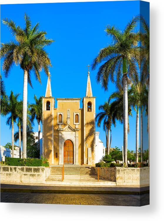 Merida Canvas Print featuring the photograph Mexican Church Sheltered by Palm Trees by Mark Tisdale