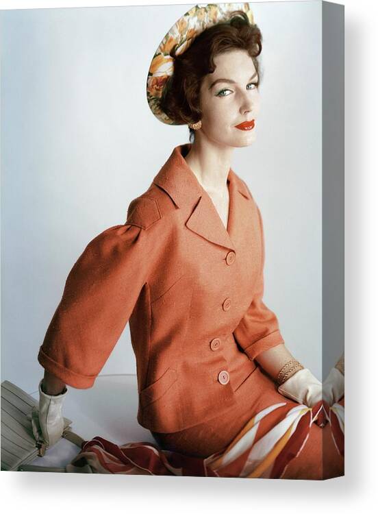 Fashion Canvas Print featuring the photograph Model Wearing An Orange Wool Suit By Dan by Henry Clarke