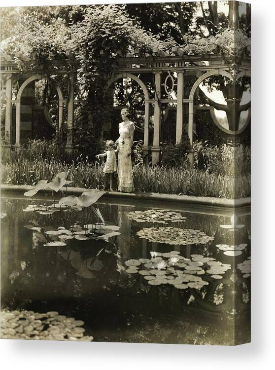 Children Canvas Print featuring the photograph Mother And Daughter By A Pond by Toni Frissell
