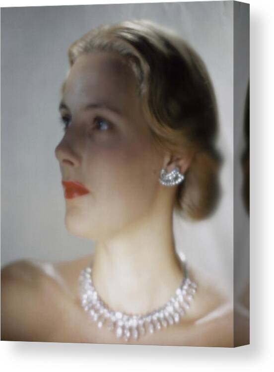 Accessories Canvas Print featuring the photograph Out Of Focus Image Of A Model Wearing A Diamond by Erwin Blumenfeld