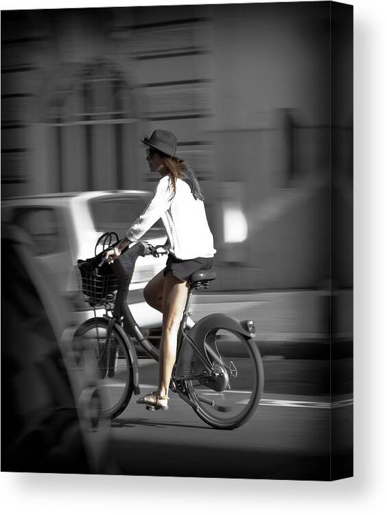 Paris Canvas Print featuring the photograph Parisian Girl Cyclist by Maj Seda