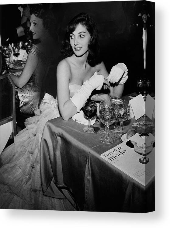 Party Canvas Print featuring the photograph Pier Agnelli Wearing An Evening Gown At A Ball by Nick De Morgoli
