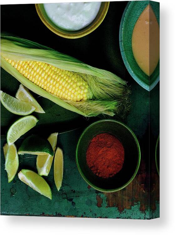 Fruitsvegetablesnobodystudio Shotstill Lifefoodgrainlimefruithealthy Eatingspiceview From Abovefreshready-to-eatprepared Foodcayennesaltmineralcorn On The Cobmayonnaisesalt #condenastgourmetphotograph September 1st 2006 Canvas Print featuring the photograph Sweetcorn And Limes by Romulo Yanes