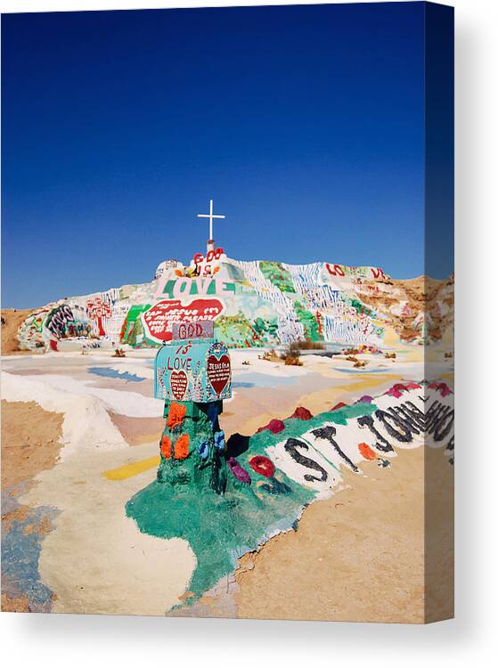 Salvation Mountain Canvas Print featuring the photograph The colorful mountain by Nastasia Cook