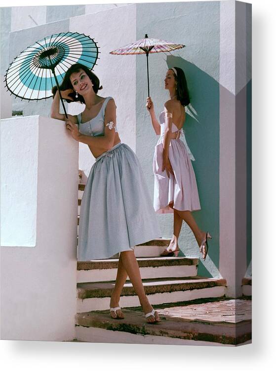 Fashion Canvas Print featuring the photograph Two Models Posing With Parasols by Frances Mclaughlin-Gill
