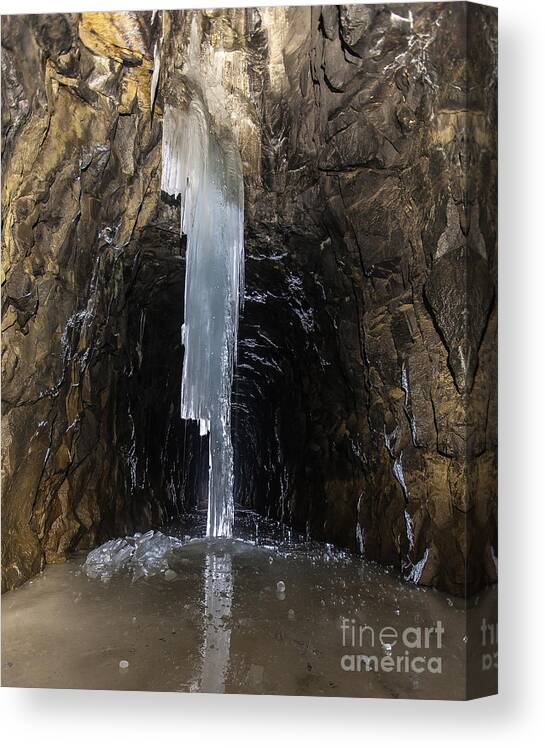 Ice Canvas Print featuring the photograph Whispering water by Charles Garcia