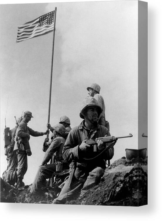 Iwo Jima Canvas Print featuring the photograph 1st Flag Raising On Iwo Jima by War Is Hell Store