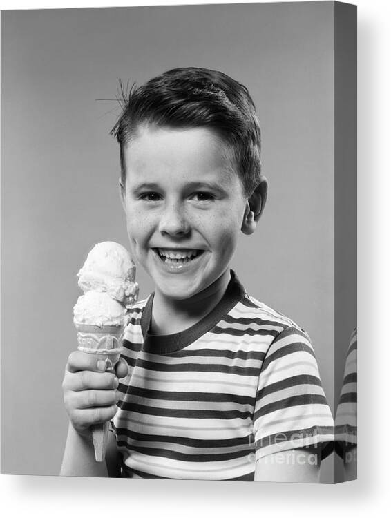 1950s Canvas Print featuring the photograph Boy With Ice Cream Cone, C.1950s by H. Armstrong Roberts/ClassicStock