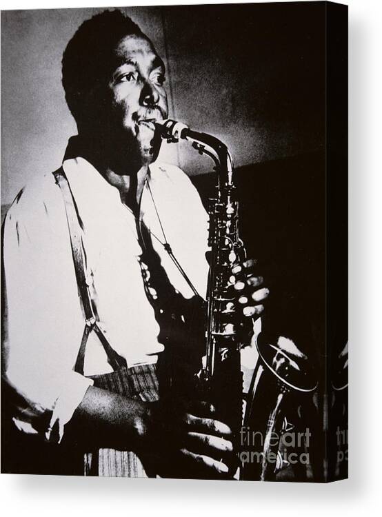 Male; Half Length; Saxophone; Musician; Musical; Instrument; Music; Black; Negro; African American; African-american; Portrait; Jazz; Saxophonist; Braces; Composer; Nickname Yardbird; Bird; Virtuoso; Suspenders; Entertainment Canvas Print featuring the photograph Charlie Parker by American School