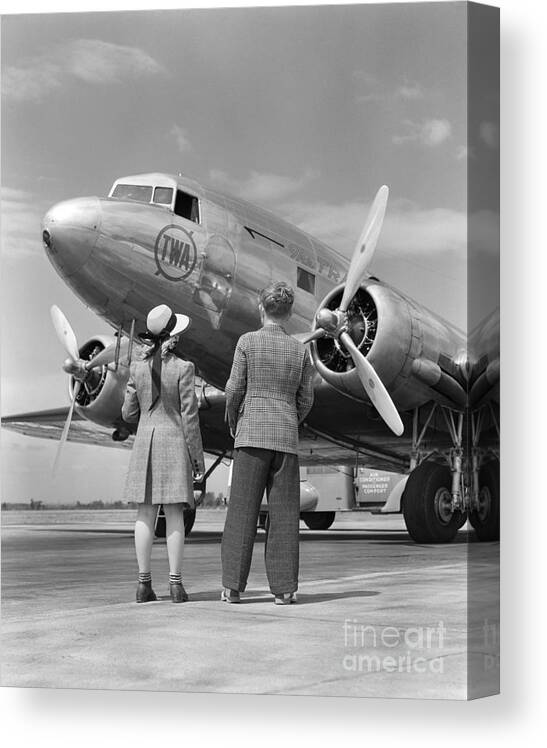 1930s Canvas Print featuring the photograph Children Looking At Plane by H. Armstrong Roberts/ClassicStock