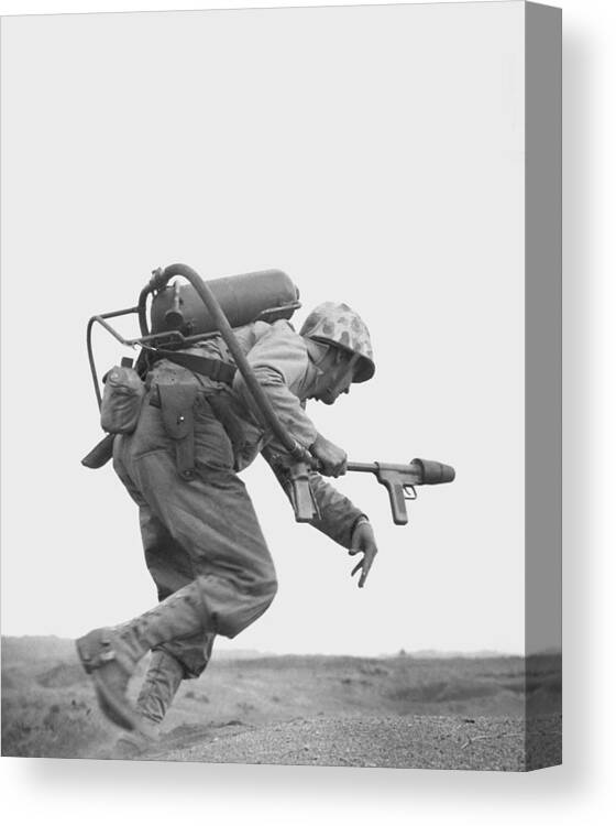 Iwo Jima Canvas Print featuring the photograph Flamethrower Operator - Battle of Iwo Jima by War Is Hell Store
