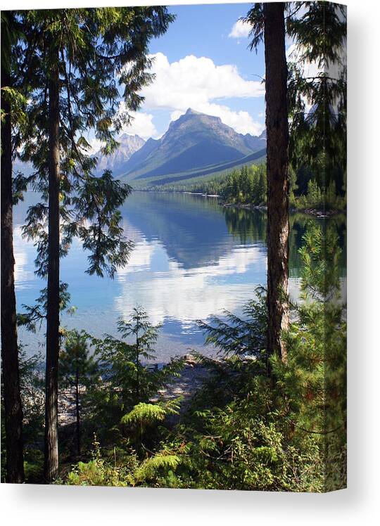 Glacier National Park Canvas Print featuring the photograph Lake McDlonald Through the Trees Glacier National Park by Marty Koch
