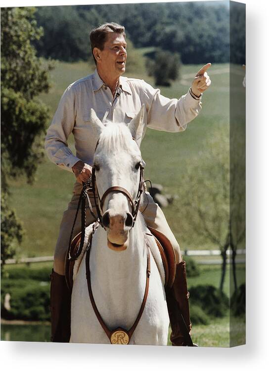 Ronald Reagan Canvas Print featuring the photograph Ronald Reagan On Horseback by War Is Hell Store