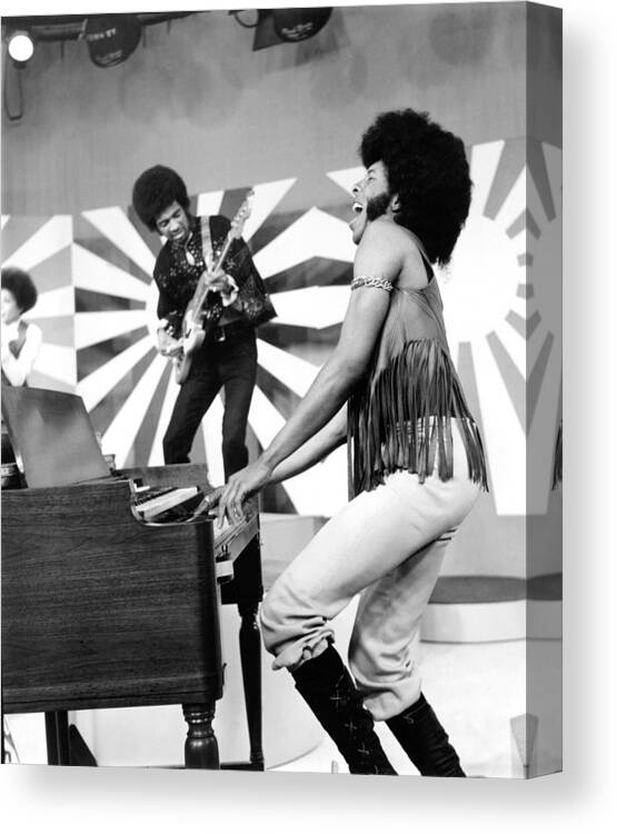 1970s Fashion Canvas Print featuring the photograph Sly And The Family Stone Performing by Everett