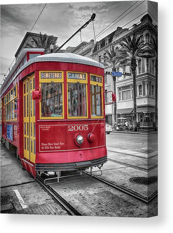 New Orleans Canvas Print featuring the photograph Street Car Crossing Bourbon Street by Susan Rissi Tregoning