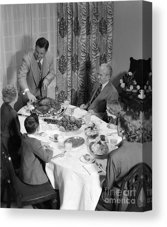 1950s Canvas Print featuring the photograph Thanksgiving Dinner, C.1950s by H. Armstrong Roberts/ClassicStock