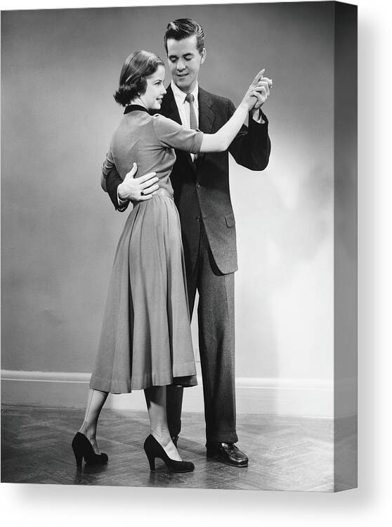 Young Men Canvas Print featuring the photograph Couple Dancing In Studio, B&w #1 by George Marks