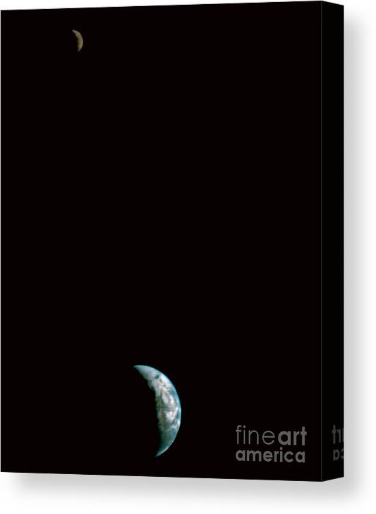 Earth Canvas Print featuring the photograph Earth And Moon #1 by Nasa/science Photo Library