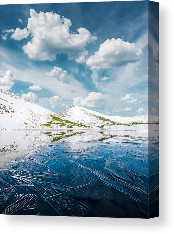 Landscape Canvas Print featuring the photograph Frozen Mountain Lake With Blue Ice #1 by Ivan Kmit